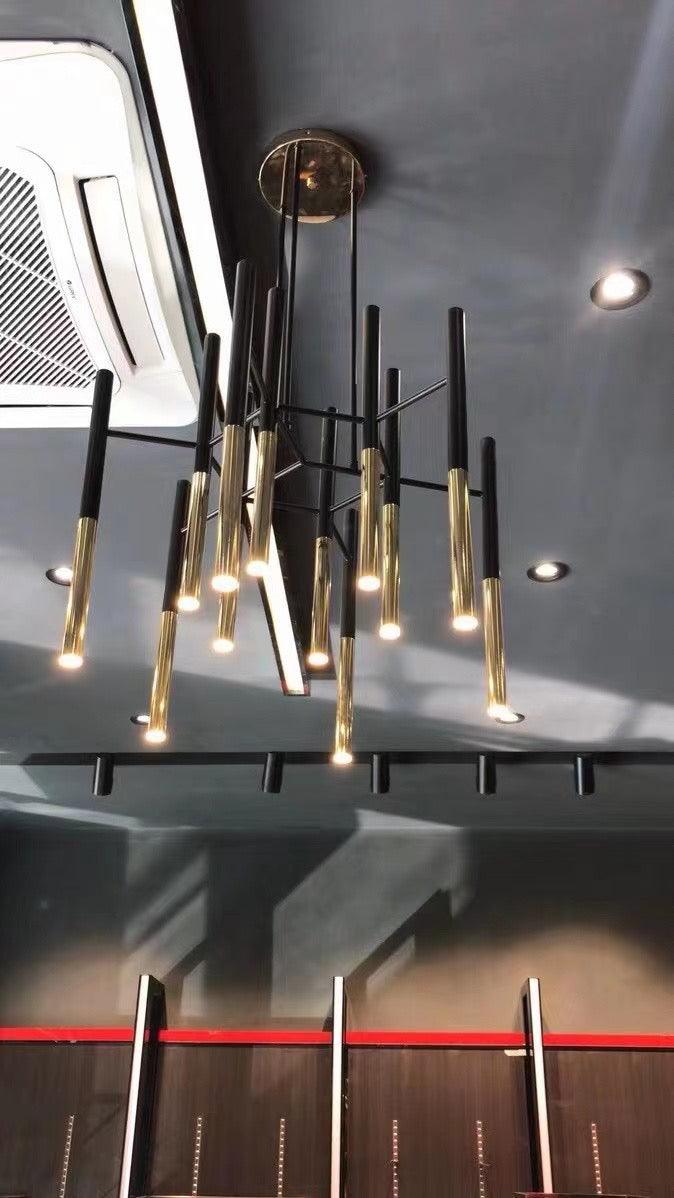 Solara Moderner Kronleuchter Stäbe Schwarz-Gold-Letslighting