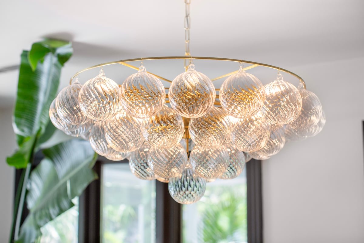 Aurora Chandelier Clear Glass Globe Aged Brass Elegant - Neutralighting