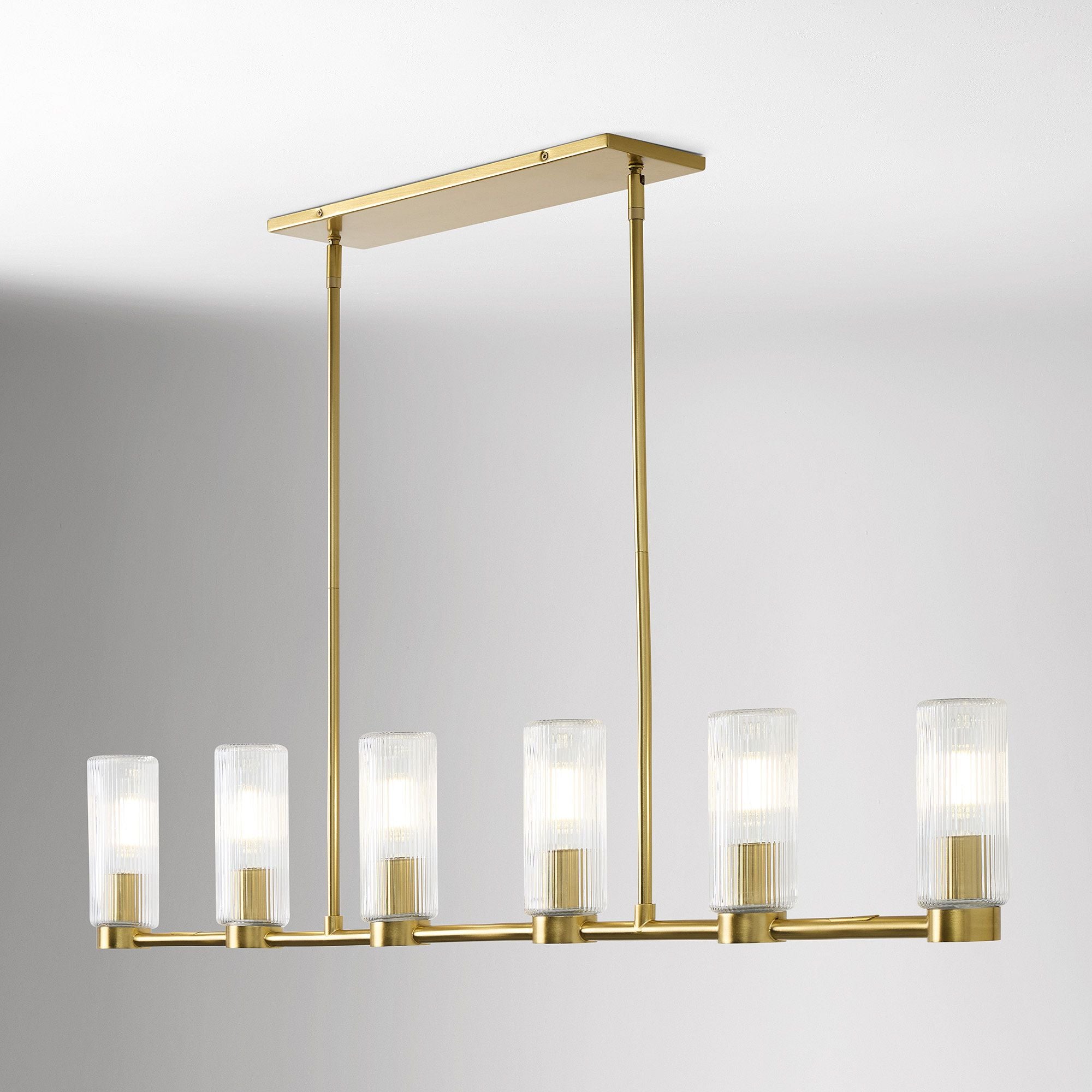 Rivora Gold Kronleuchter mit geriffelten Glasschirmen