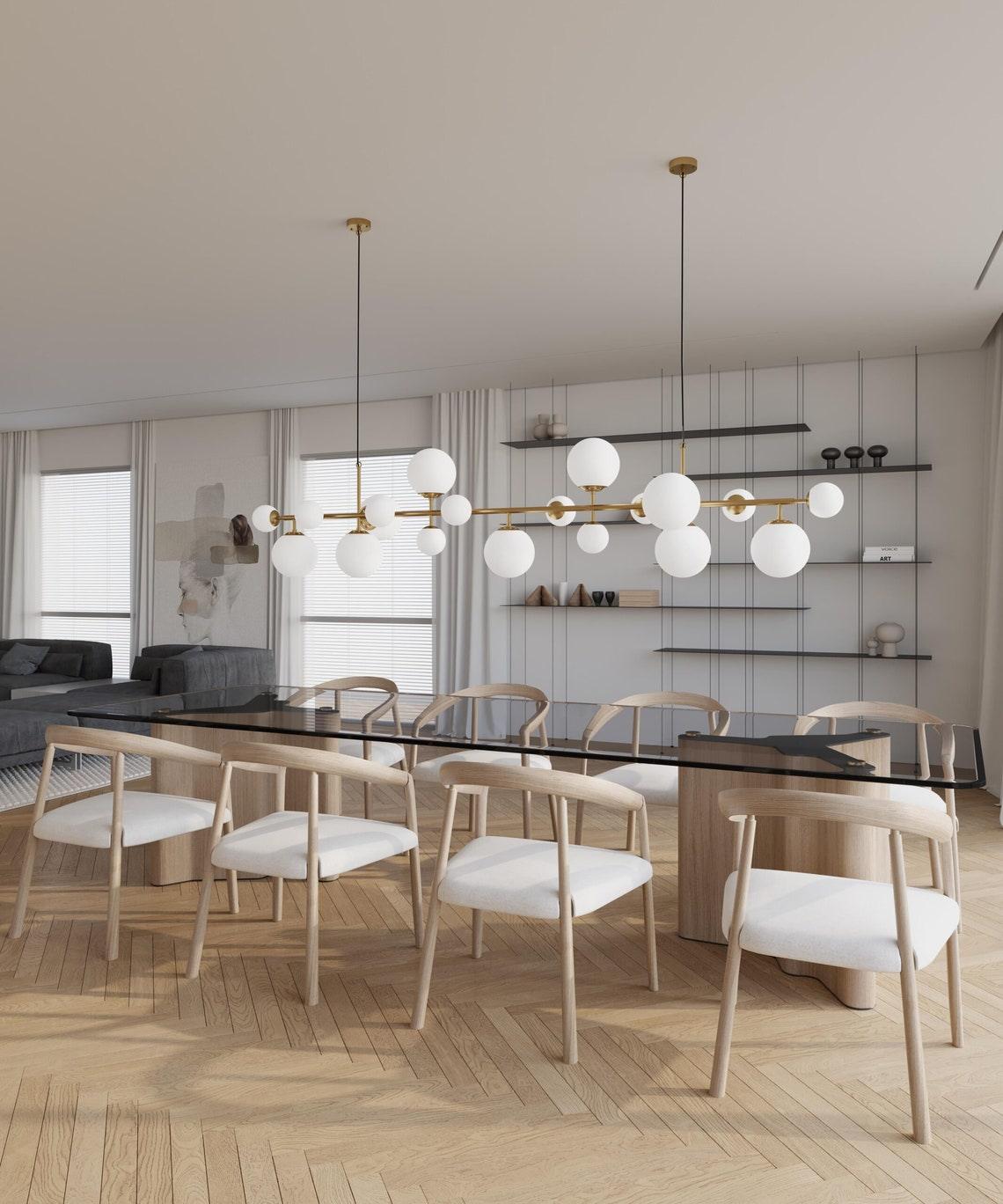 Solara Kronleuchter Messing Glas Globus-Letslighting